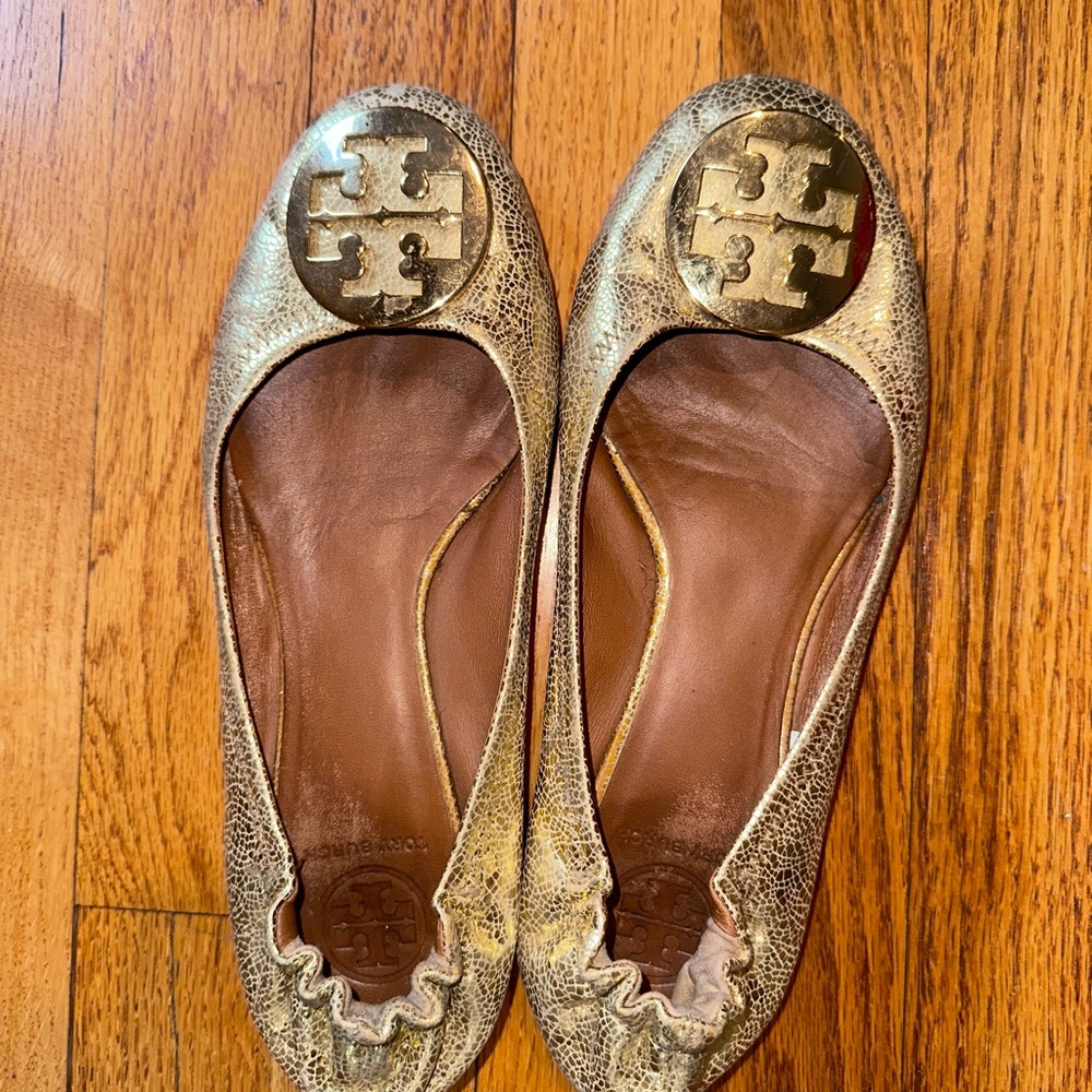Tory Burch Gold Flats with Metallic Emblem and Snakeskin Texture